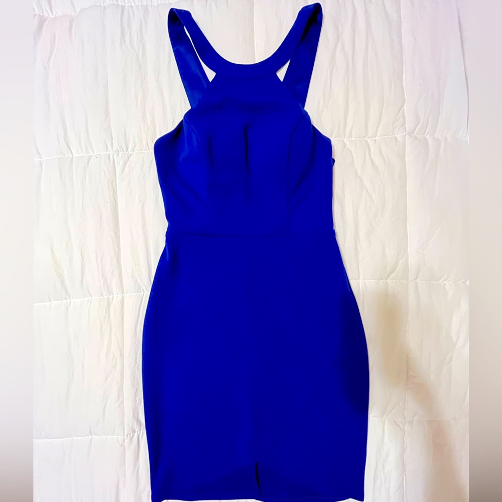 Let’s go queen! Beautiful classy and sexy body con dress with open back.